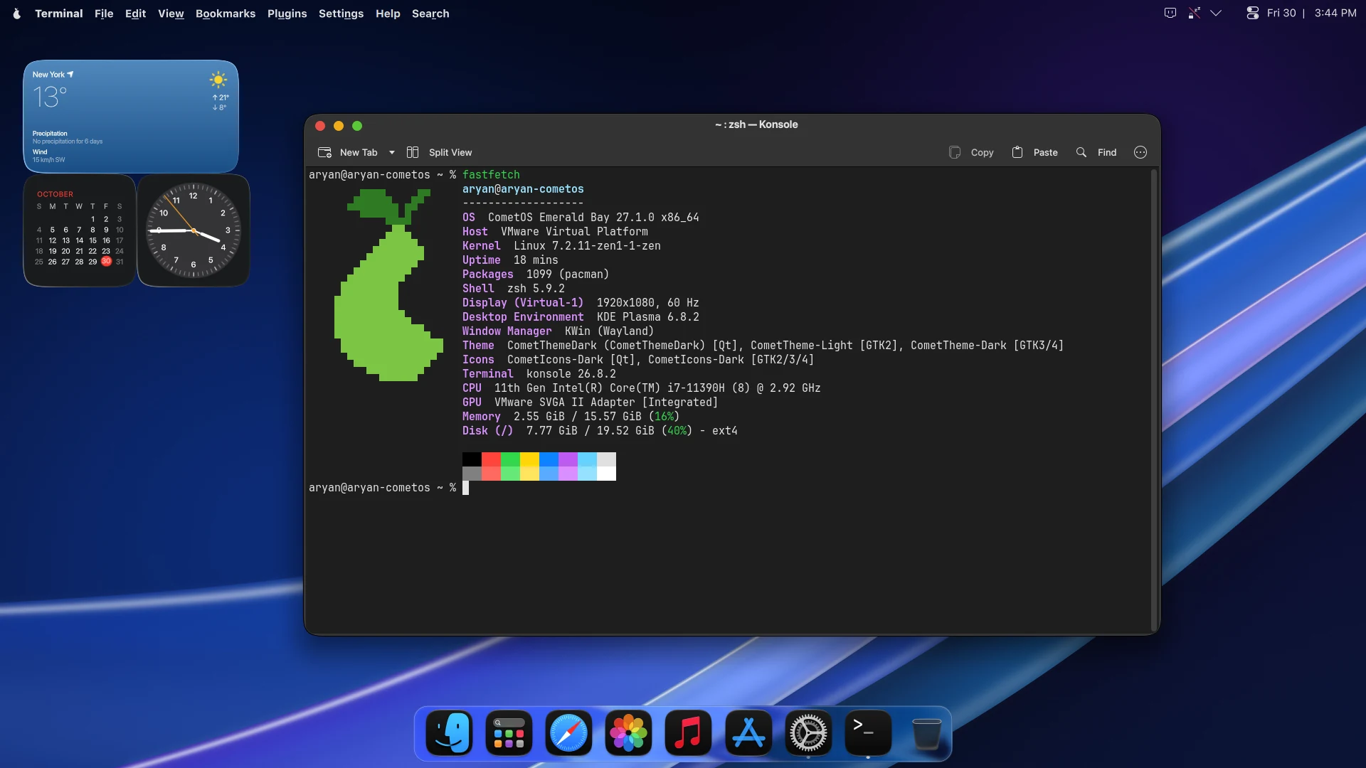 Terminal. Dark by default. Here, fastfetch: CometOS on the zen kernel, with packages from pacman.